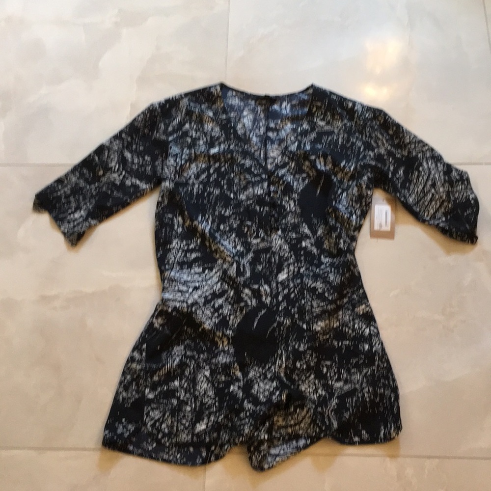 Closet staple. Black and white romper.
